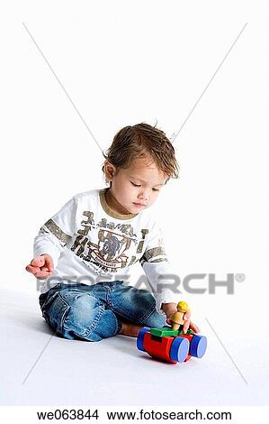 Picture - baby, child, boy, black hair, 3-4 years. Fotosearch