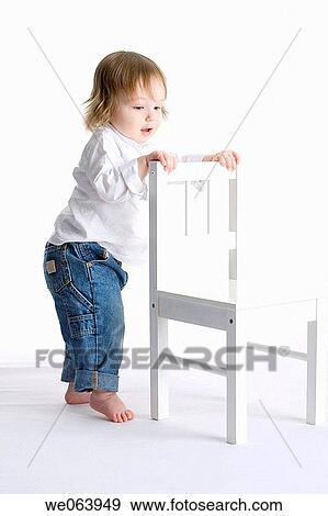 baby, child, chair, barefoot, 3-4 years View Large Photo Image Stock Photo - baby, child, chair, barefoot, 3-4 years. Fotosearch