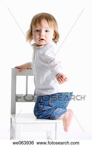baby, child, chair, barefoot, ability View Large Photo Image Stock Photograph - baby, child, chair, barefoot, ability. Fotosearch