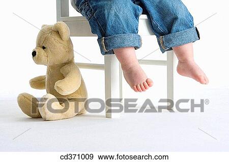 baby, child, chair, barefoot, anonymous View Large Photo Image Stock Photo - baby, child, chair, barefoot, anonymous. Fotosearch