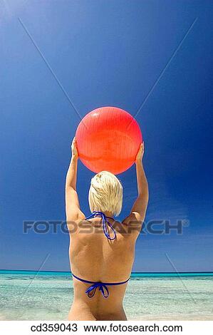 back view, ball, balance, Arms raised View Large Photo Image Stock Image - back view, ball, balance, Arms raised. Fotosearch