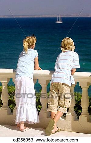 back view, balustrade, bannister, boy, brother, calm View Large Photo Image Stock Image - back view, balustrade, bannister, boy, brother, calm. Fotosearch