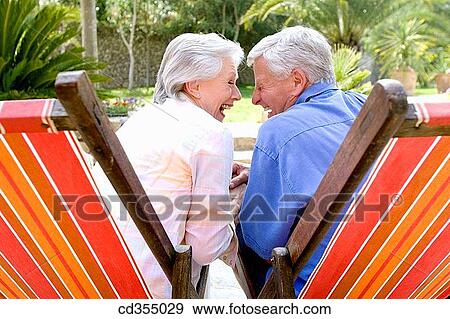 back view, complicity, amusement View Large Photo Image Stock Photo - back view, complicity, amusement. Fotosearch
