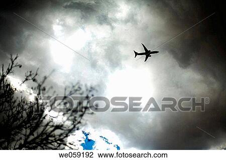 backlight, aircraft, atmosphere, altitude, airplane, aeroplane View Large Photo Image Stock Image - backlight, aircraft, atmosphere, altitude, airplane, aeroplane. Fotosearch