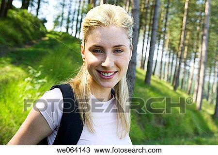 Stock Image - backpack, blond, contemporary. Fotosearch