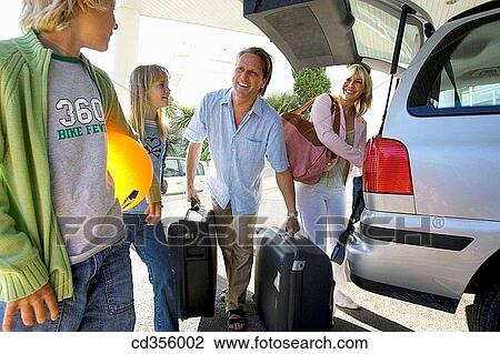 Stock Image - baggage, boy, boot, automobile. Fotosearch