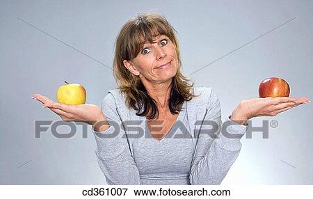 balance, choosing, choice, apple View Large Photo Image Stock Photo - balance, choosing, choice, apple. Fotosearch
