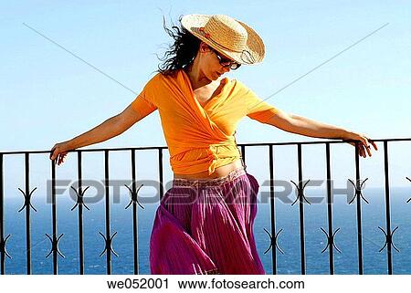 balcony, calm, brunette, Arms open View Large Photo Image Stock Image - balcony, calm, brunette, Arms open. Fotosearch