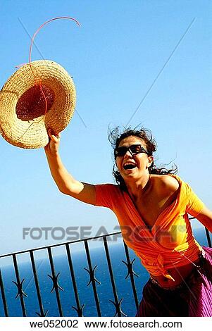 balcony, carefree, brunette, Arms raised View Large Photo Image Stock Image - balcony, carefree, brunette, Arms raised. Fotosearch