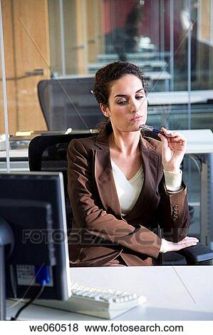 Ball-point pen, business, brunette, absorbed View Large Photo Image Stock Photo - Ball-point pen, business, brunette, absorbed. Fotosearch
