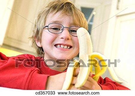 Banana, blond, blue eyes, boy, child View Large Photo Image Stock Image - Banana, blond, blue eyes, boy, child. Fotosearch