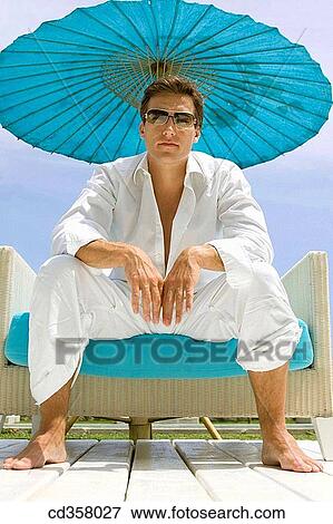barefoot, chair, black hair, armchair View Large Photo Image Stock Photo - barefoot, chair, black hair, armchair. Fotosearch