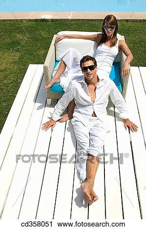 barefoot, chilling out, chair, calm, armchair View Large Photo Image Stock Image - barefoot, chilling out, chair, calm, armchair. Fotosearch