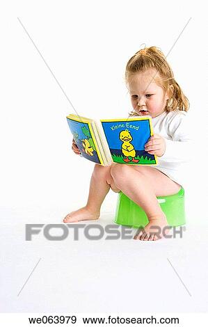 Stock Photo - barefoot, Cloth book, childhood, child, 3-4 years. Fotosearch