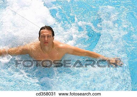 bath, Body care, black hair, bathing, Arms open View Large Photo Image Stock Image - bath, Body care, black hair, bathing, Arms open. Fotosearch