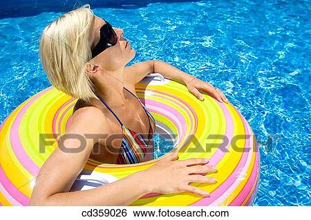 Stock Photograph - bathe, bathing, blond, calm. Fotosearch