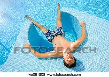 Stock Photo - bathe, bathing, brunette, calm. Fotosearch