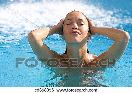 bathe, bathing, brunette, chilling out View Large Photo Image Stock Photograph - bathe, bathing, brunette, chilling out. Fotosearch
