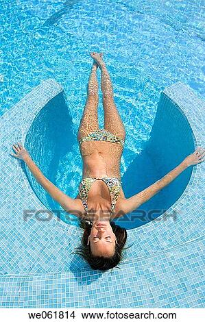 bathe, bathing, brunette View Large Photo Image Picture - bathe, bathing, brunette. Fotosearch