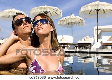 Stock Photograph - bathe, bathing, brunette. Fotosearch
