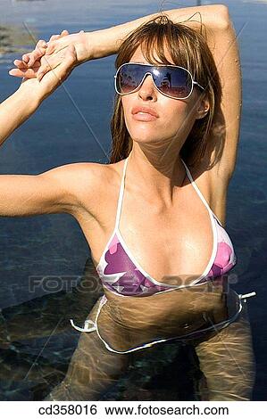 bathe, brunette, bathing, Arms raised View Large Photo Image Stock Photograph - bathe, brunette, bathing, Arms raised. Fotosearch