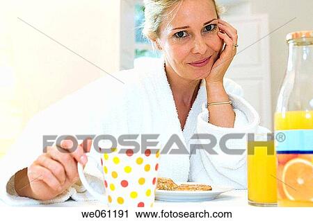 Stock Image - bathrobe, coffee, breakfast, at-home. Fotosearch