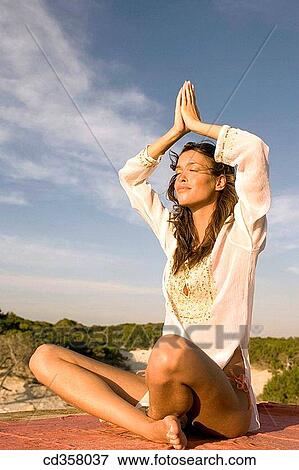 beach, concentrate, Arms raised View Large Photo Image Stock Photo - beach, concentrate, Arms raised. Fotosearch