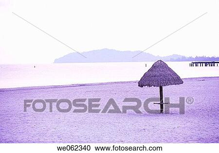 Beach with straw hut View Large Photo Image Stock Image - Beach with straw hut. Fotosearch
