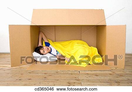 bed, blanket, brunette, cardboard View Large Photo Image Stock Photograph - bed, blanket, brunette, cardboard. Fotosearch