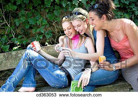 Stock Image - bench, camera, break-time, break, amusement. Fotosearch