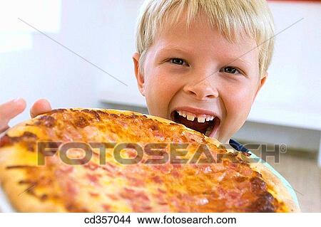 big, bite, biting, blond, boy View Large Photo Image Picture - big, bite, biting, blond, boy. Fotosearch