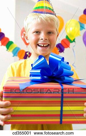 Birthday party, blond, bow, boy, cap View Large Photo Image Stock Image - Birthday party, blond, bow, boy, cap. Fotosearch