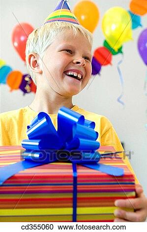 Birthday party, blond, bow, boy, cap View Large Photo Image Stock Image - Birthday party, blond, bow, boy, cap. Fotosearch