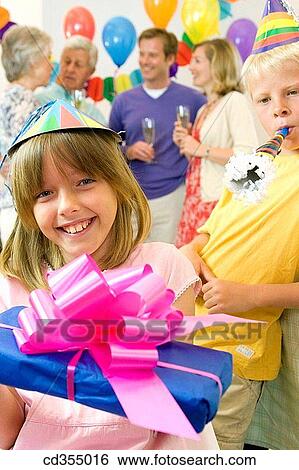 Birthday party, bow, 3 generations View Large Photo Image Stock Photograph - Birthday party, bow, 3 generations. Fotosearch