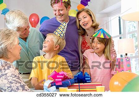 Birthday party, brother, boy, 3 generations View Large Photo Image Stock Photo - Birthday party, brother, boy, 3 generations. Fotosearch