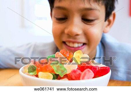 Stock Image - black hair, bowl, boy, child, childhood. Fotosearch