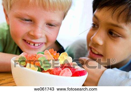 Stock Image - black hair, bowl, boy, child, childhood. Fotosearch