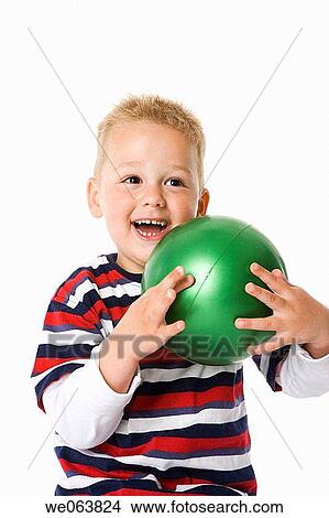 Picture - blond, amusement, ball, baby, anticipation, 3-4 years. Fotosearch