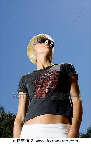 blond, blue, blue sky View Large Photo Image Stock Image - blond, blue, blue sky. Fotosearch