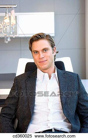 Stock Photography - blond, blue eyes, business, businessman, businesspeople. Fotosearch