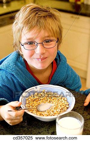 blond, breakfast, boy, bowl, at-home View Large Photo Image Stock Photography - blond, breakfast, boy, bowl, at-home. Fotosearch