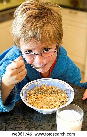 blond, breakfast, boy, bowl, at-home View Large Photo Image Stock Photography - blond, breakfast, boy, bowl, at-home. Fotosearch