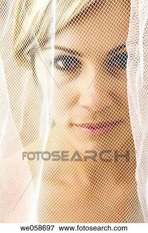 Stock Photo - blond, Brown eye, Close-up. Fotosearch