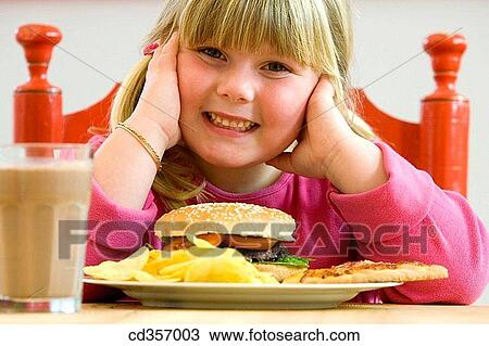 blond, burger, calorie, child, childhood View Large Photo Image Stock Image - blond, burger, calorie, child, childhood. Fotosearch