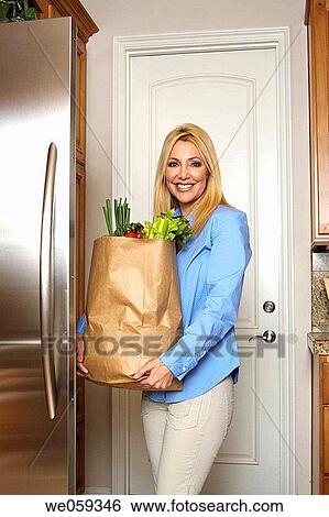 blond, carrying, carry, blue eyes, at-home View Large Photo Image Stock Photograph - blond, carrying, carry, blue eyes, at-home. Fotosearch