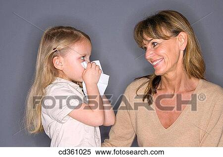 Blow nose, child, Blowing nose, affection View Large Photo Image Stock Photography - Blow nose, child, Blowing nose, affection. Fotosearch