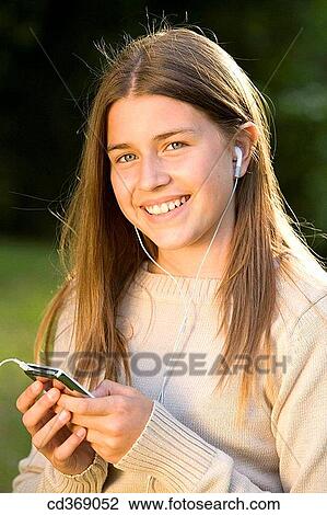 Stock Image - blue eyes, day, contemporary, adolescence. Fotosearch