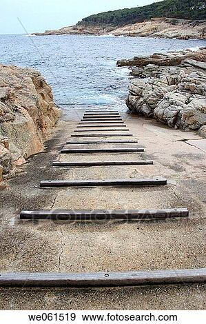 Boat pier, Tamariu, Calella de Palafrugell. Girona province, Catalonia, Spain View Large Photo Image Stock Photo - Boat pier, Tamariu, Calella de Palafrugell. Girona province, Catalonia, Spain. Fotosearch