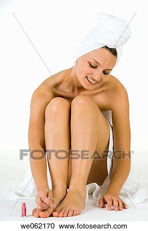 Stock Image - Body care, attractive, beauty, beautiful, barefoot, attitude. Fotosearch