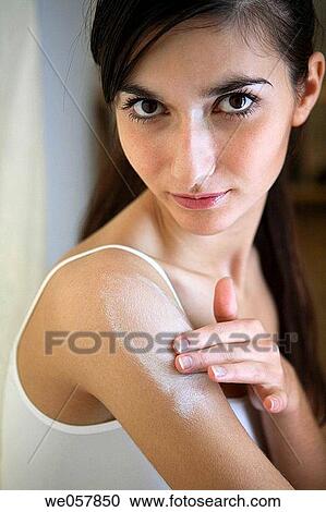 Body care, carnality, brunette, apply View Large Photo Image Stock Image - Body care, carnality, brunette, apply. Fotosearch